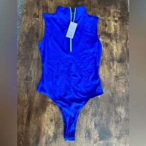 Wild fable royal blue 1/4 zip bodysuit Sz small.